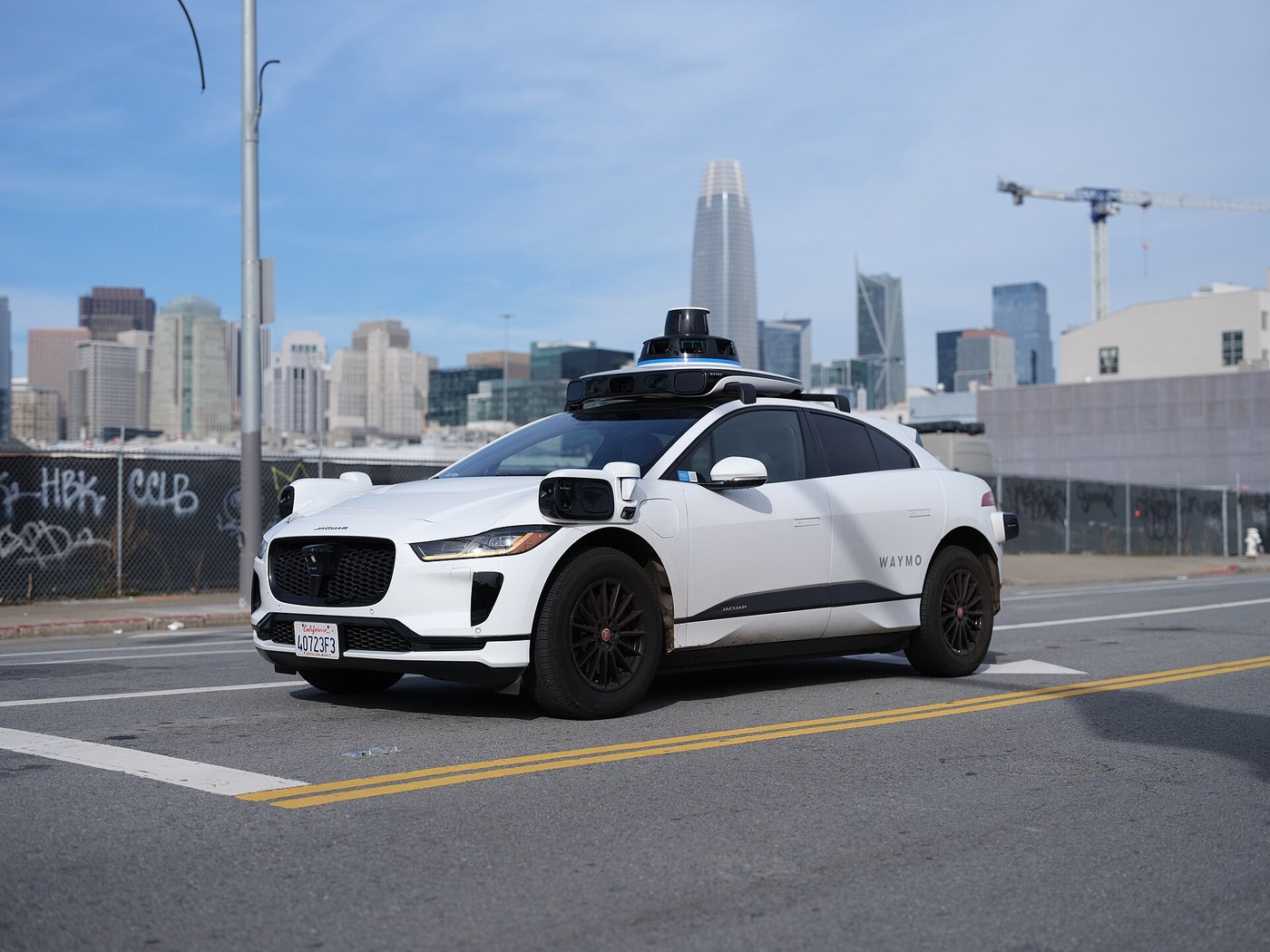 A Waymo Jaguar I-Pace robotaxi in San Francisco in 2023. Waymo opened its driverless service in Denver to the public on Sept. 1. File photo.