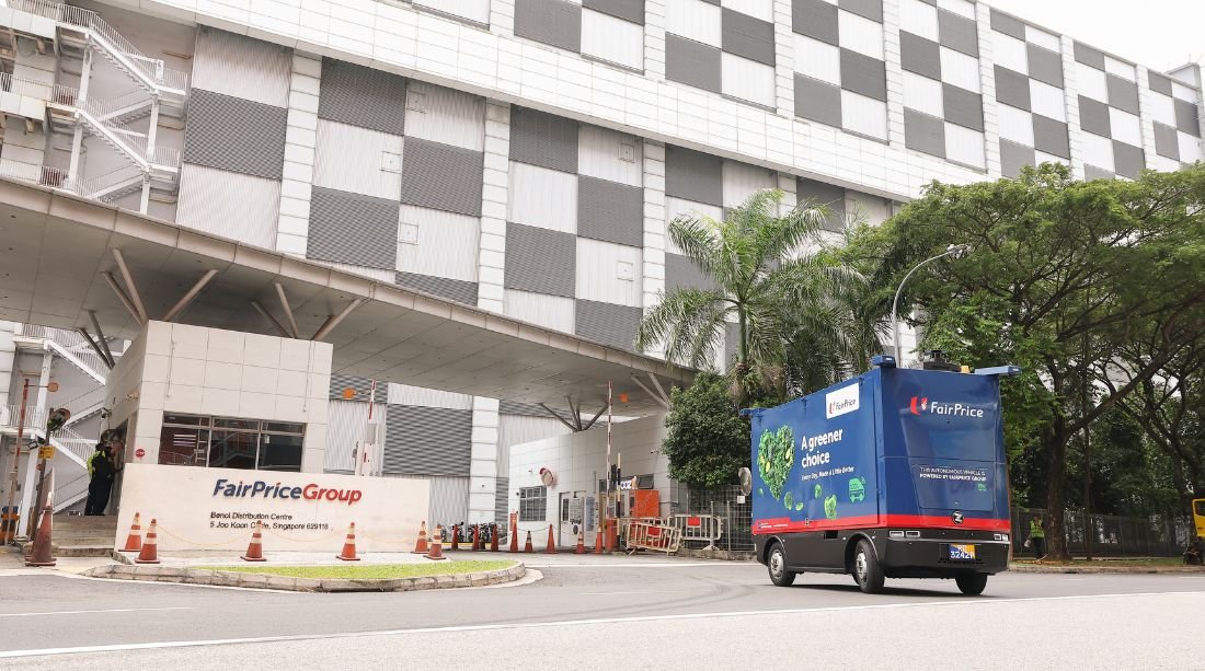 A FairPrice Group autonomous cargo vehicle used on a retailer-supplier route.