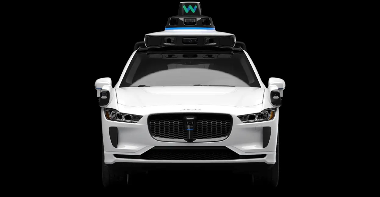 Front view of a Waymo Jaguar I-PACE robotaxi.