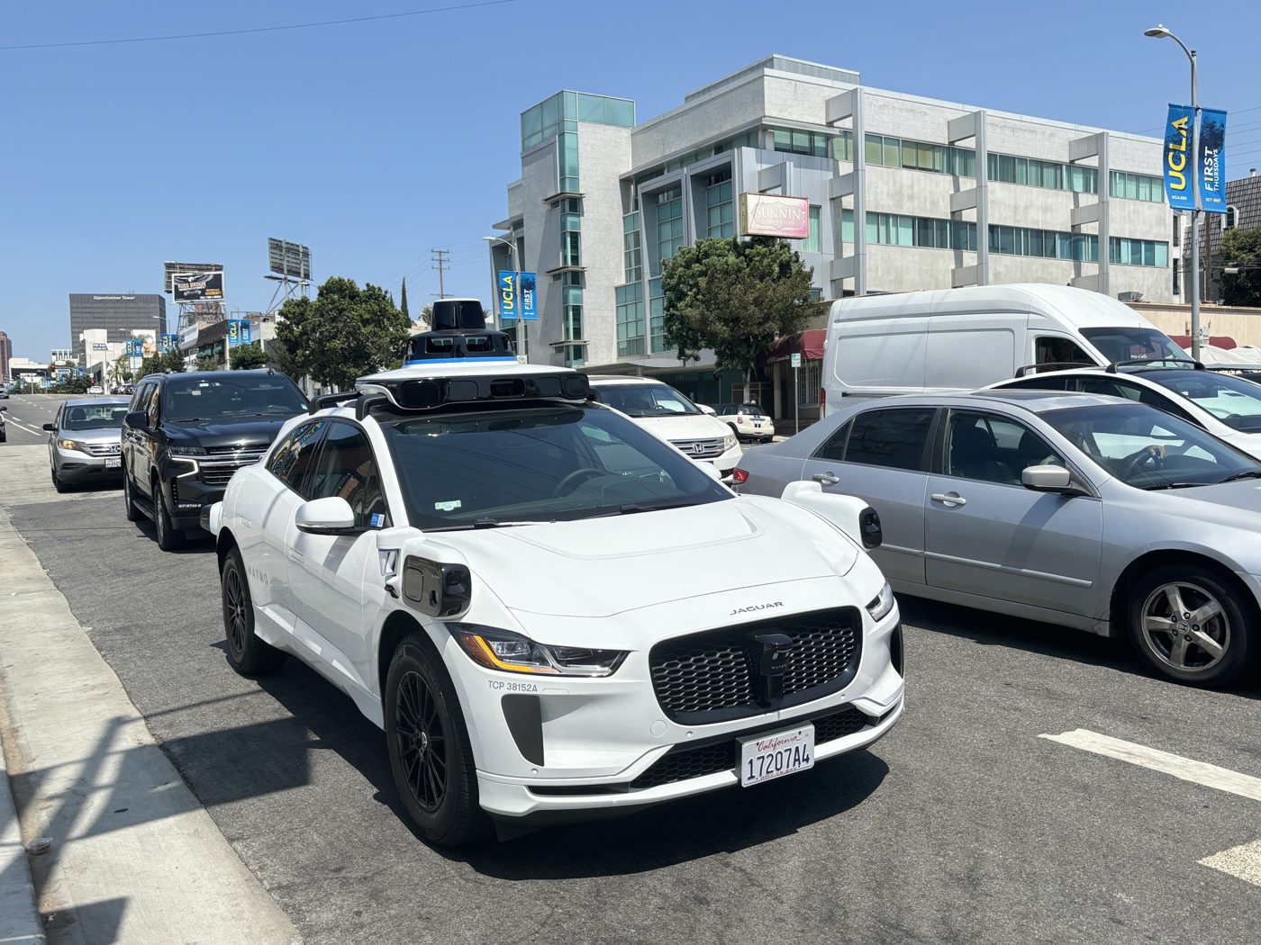 A Waymo Jaguar I-Pace robotaxi on Westwood Boulevard in Los Angeles in August 2024. File photo.