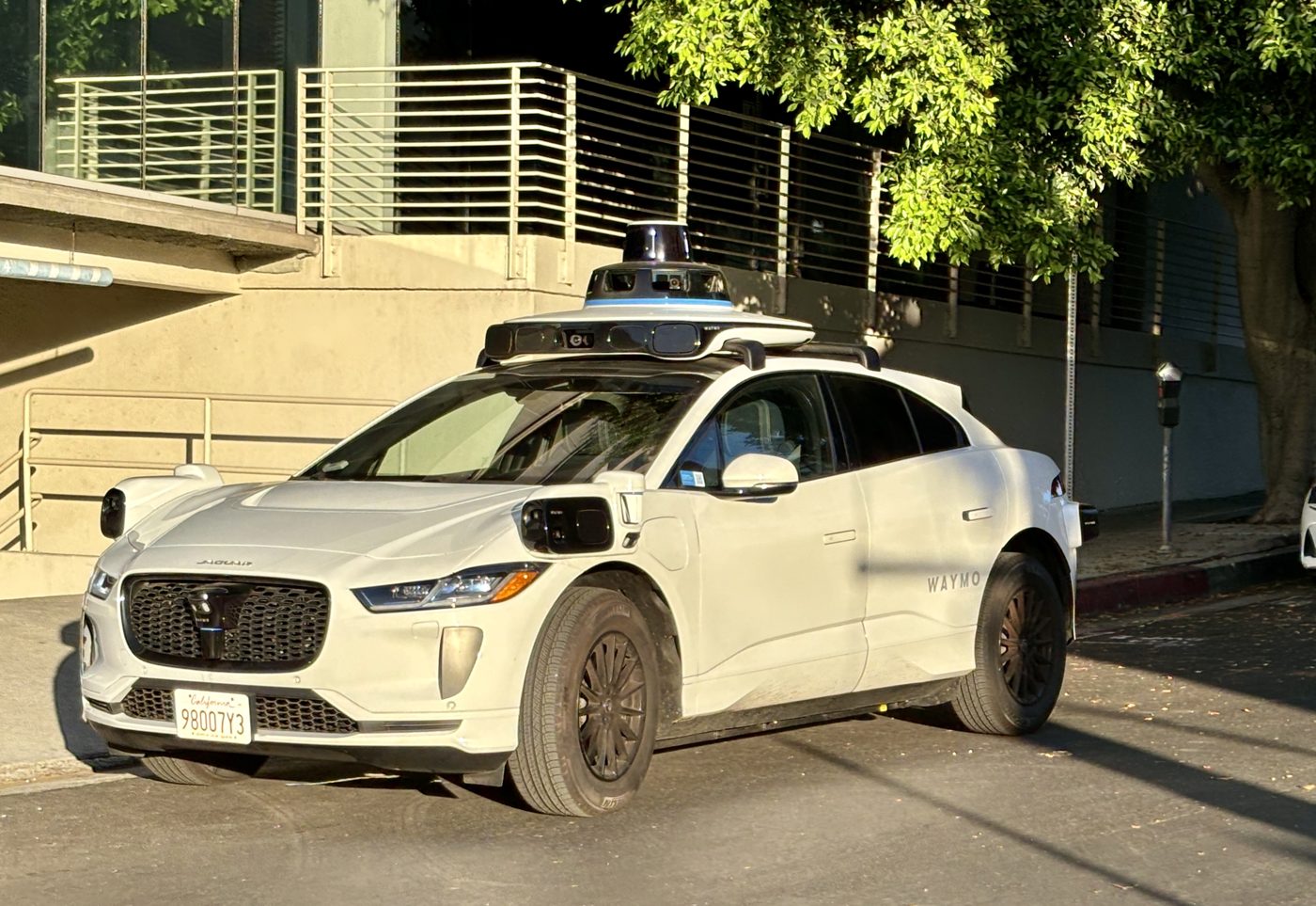 A Waymo Jaguar I-Pace robotaxi on a street in Century City, Los Angeles, in August 2024. File photo.