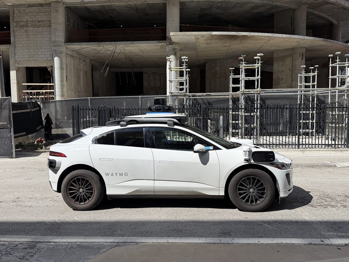 A Waymo Jaguar I-Pace robotaxi in the Brickell district of Miami in October 2026. File photo.