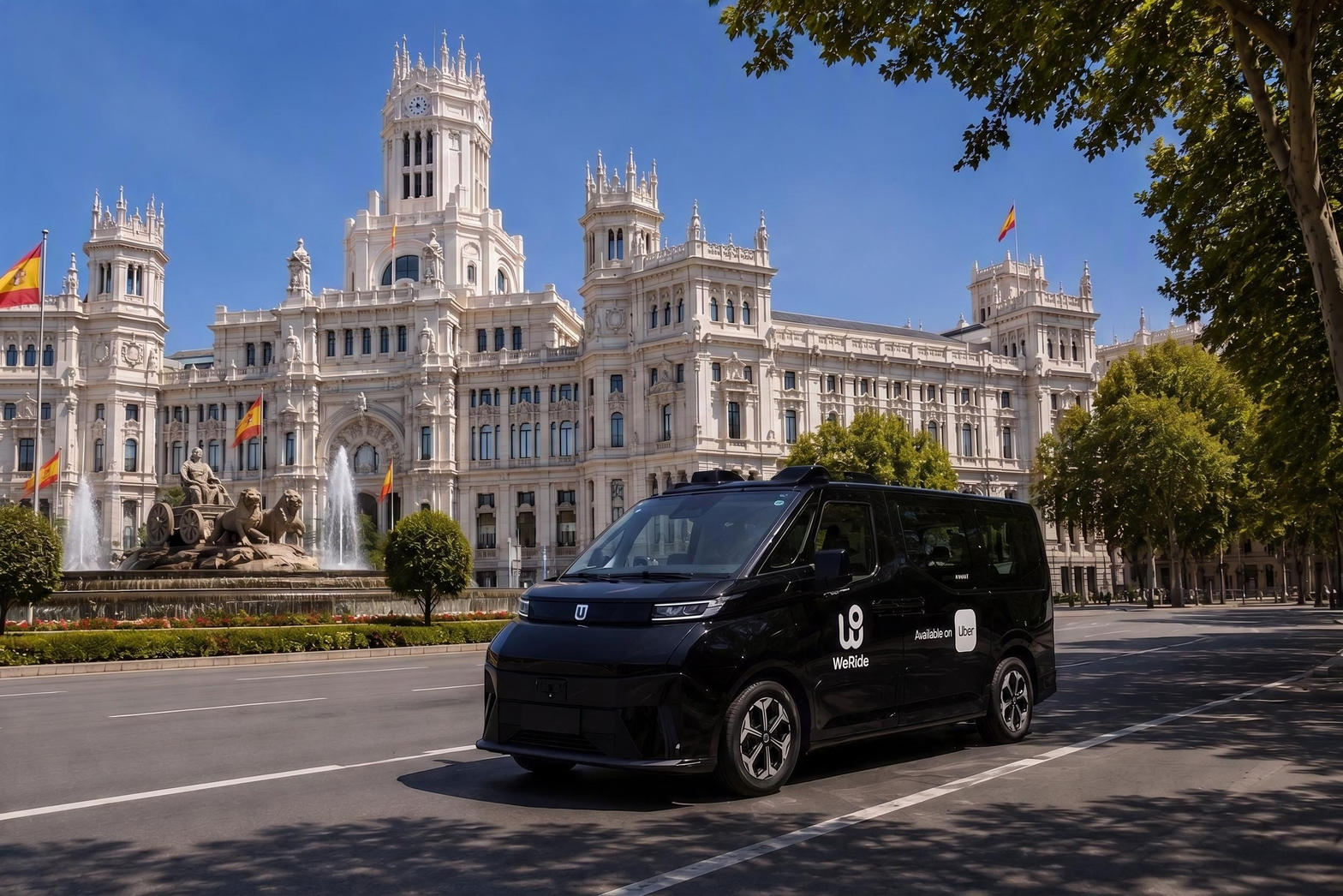 WeRide GXR robotaxi on a Madrid boulevard.