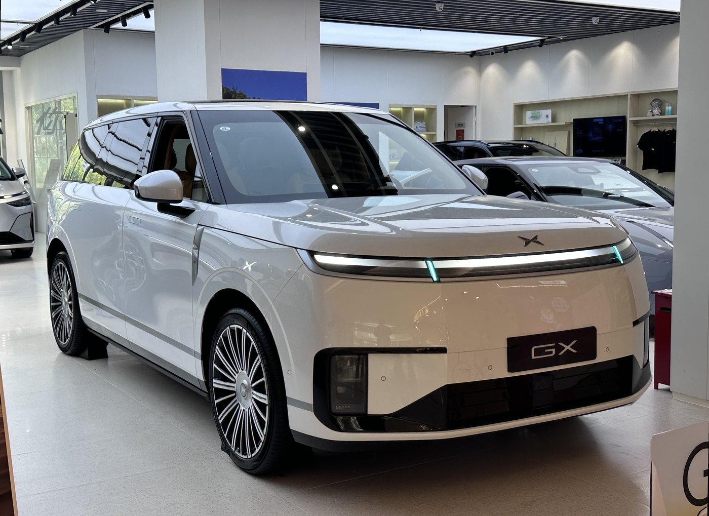 An XPENG GX, the sport utility vehicle on which the YOYO robotaxi is built, in a showroom in April 2026. File photo.