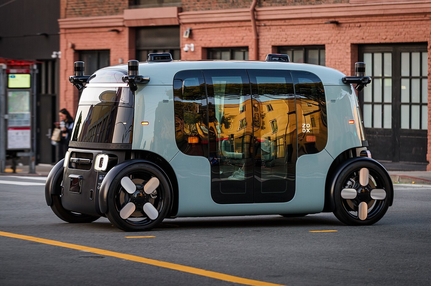 An occupied Zoox robotaxi crosses Potrero Street in San Francisco in May 2025. File photo.